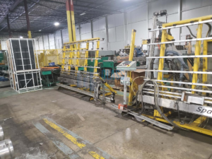 Spadix vertical hot melt gunner